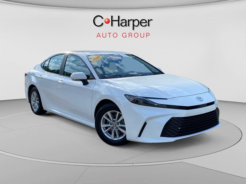 2025 Toyota Camry LE in White — front three-quarter view